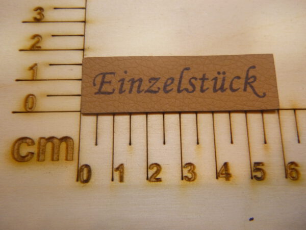 Kunstlederlabel "Einzelstück"