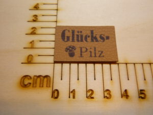 Kunstlederlabel "Glückspilz"