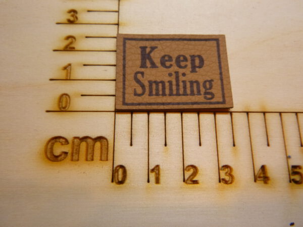 Kunstlederlabel "Keep Smiling"