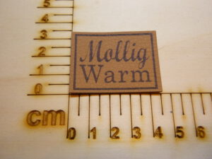 Kunstlederlabel "Mollig warm"